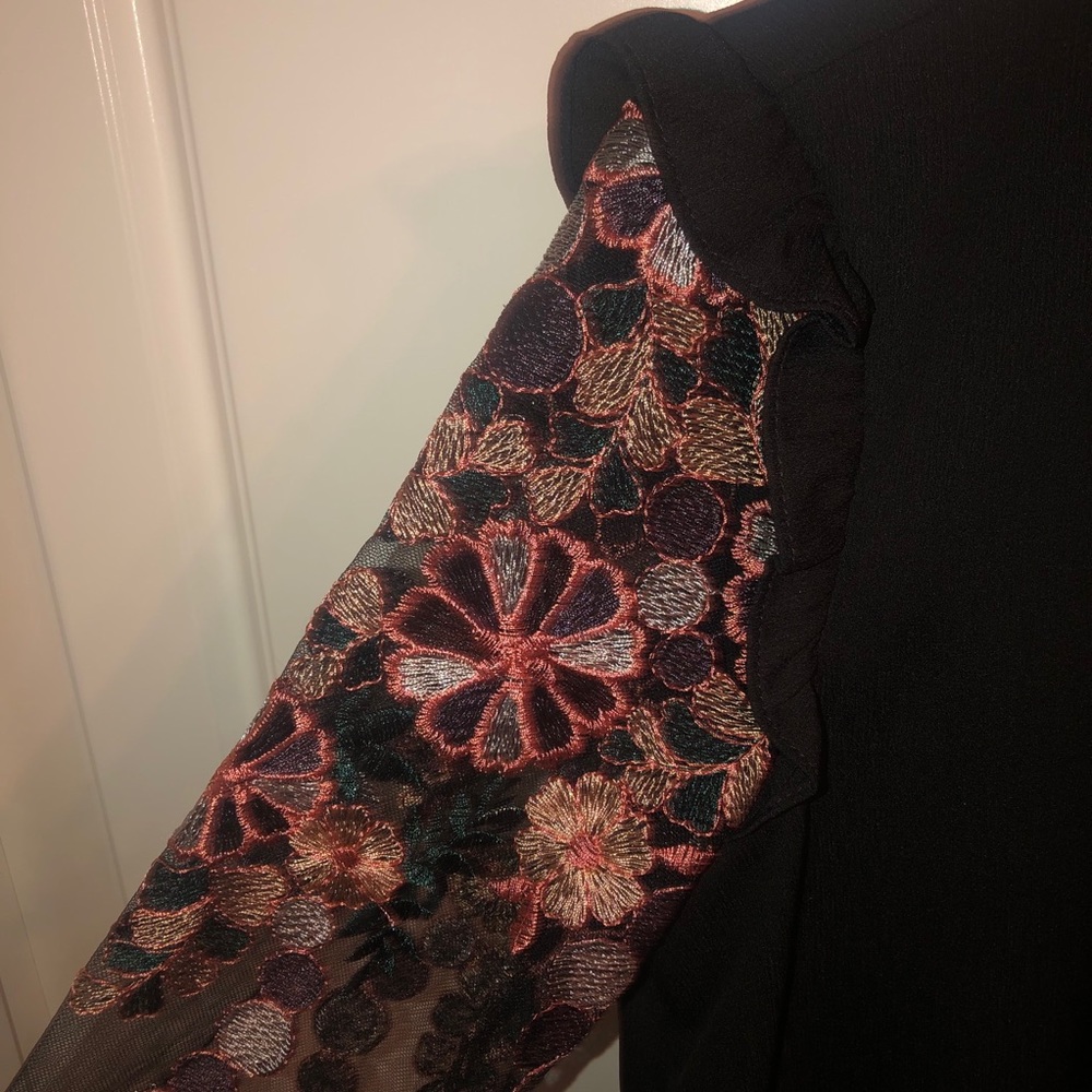 Black blouse with floral embroidery